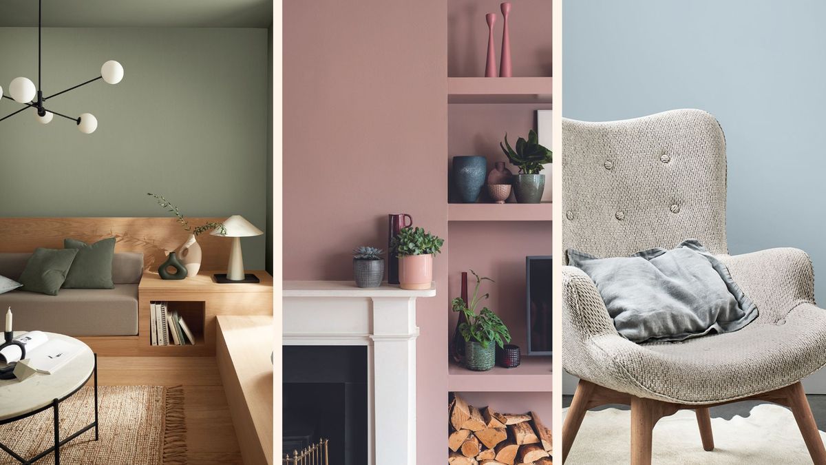 A cozy living room with walls painted in a soft grey color and accented with white and gold decor